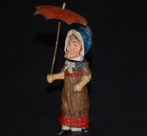 G. Heyde Dresden * head wobbler figure * caricature lady with hood and umbrella * around 1900
